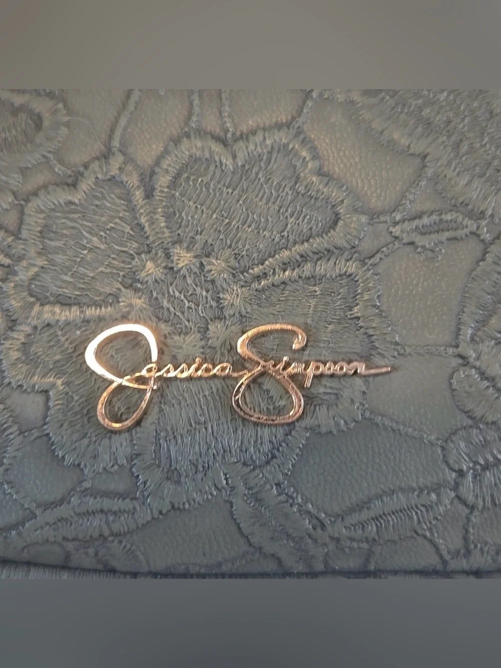 Jessica Simpson Gloria Mid Crossbody Bag in an embossed olive green floral finis